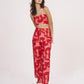 Red geometric printed co-ord set with tube crop top and wide-leg palazzo pants