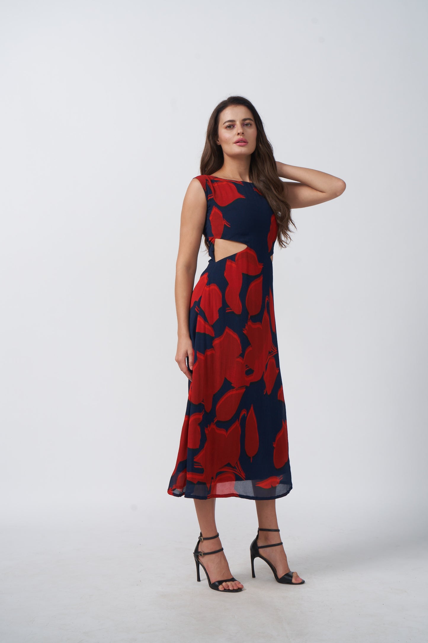Red and navy abstract floral print midi dress with a sleek, modern silhouette