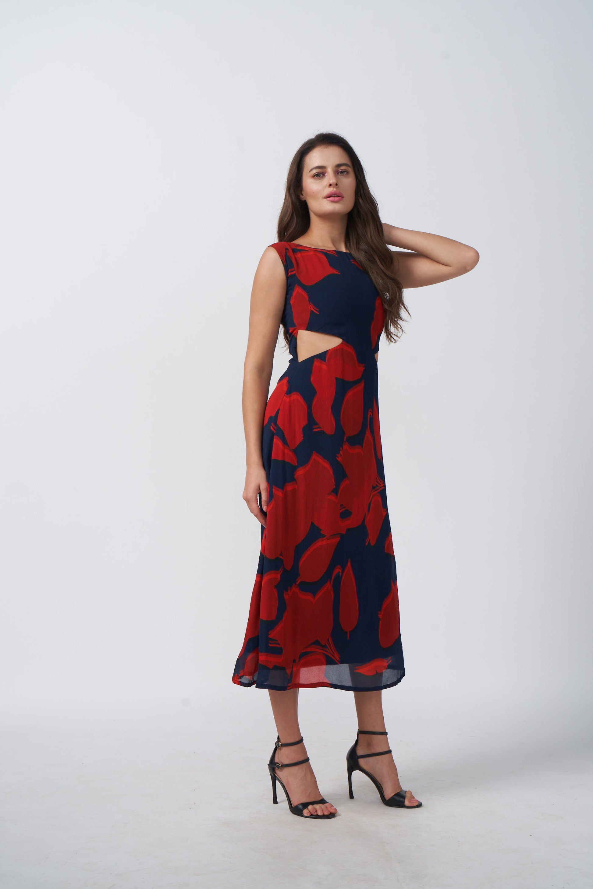 Red and navy abstract floral print midi dress with a sleek, modern silhouette