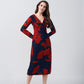 Midi-length dress featuring a bold abstract floral print in scarlet red against a deep navy blue background. The design showcases a flattering V-neckline and long, fitted sleeves. 