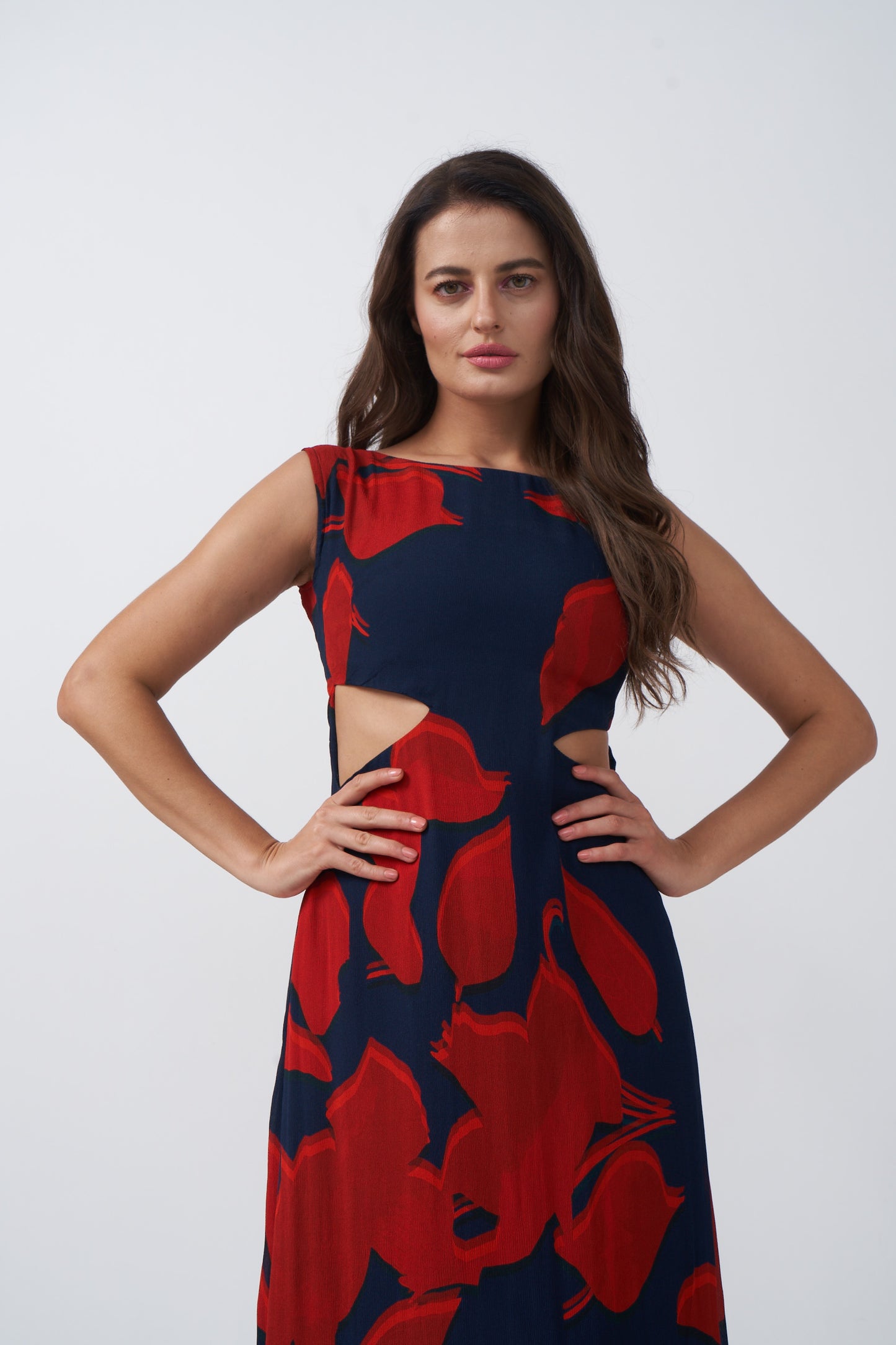 Close-up view highlighting the square neckline and abstract floral pattern of the dress.