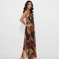 Artistic abstract printed maxi dress ideal for tropical resort wear, summer evening events, or outdoor bohemian-themed gatherings.