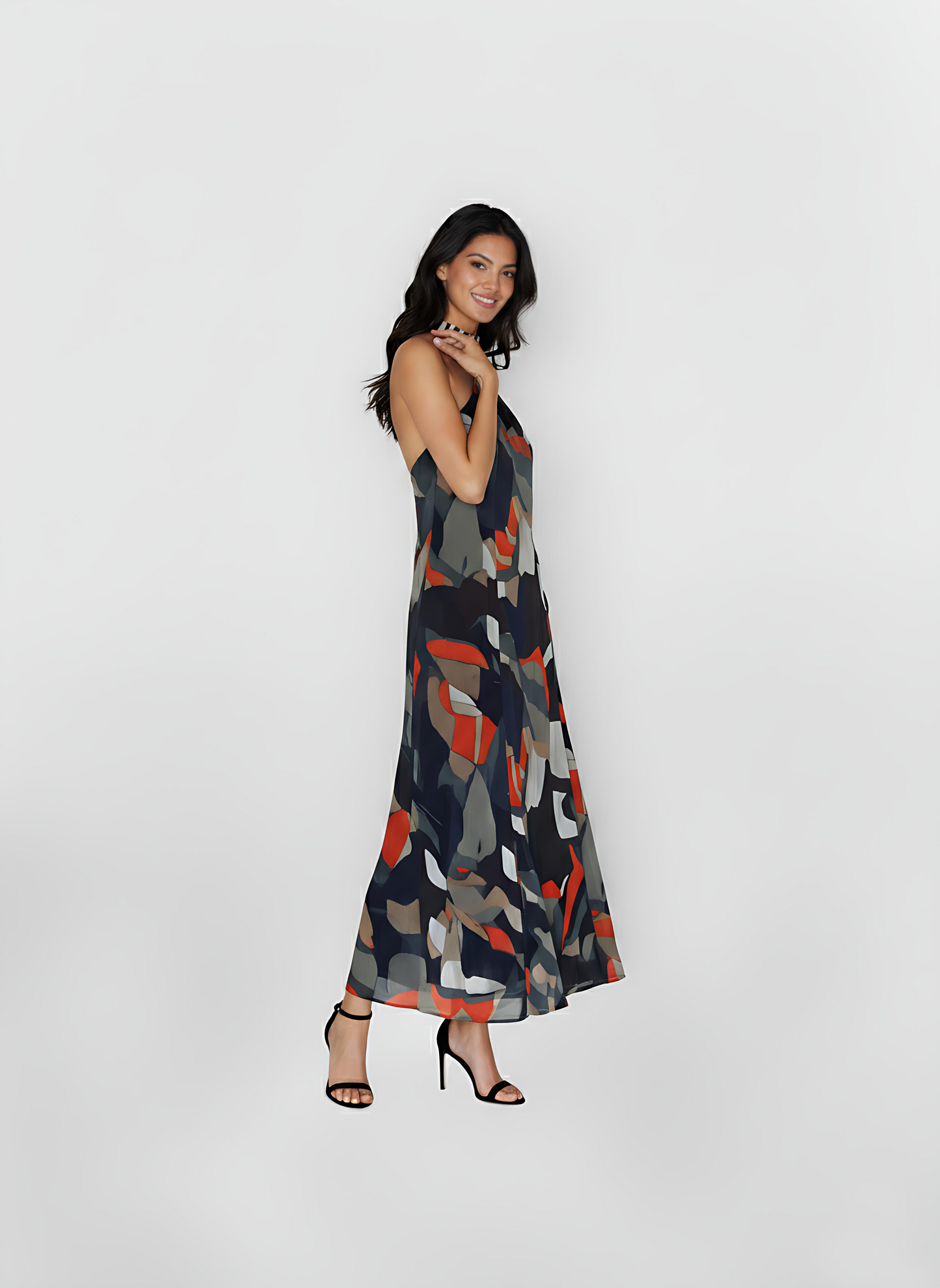Halter-neck abstract print maxi dress with a fluid silhouette, suitable for daytime outings and resort evenings