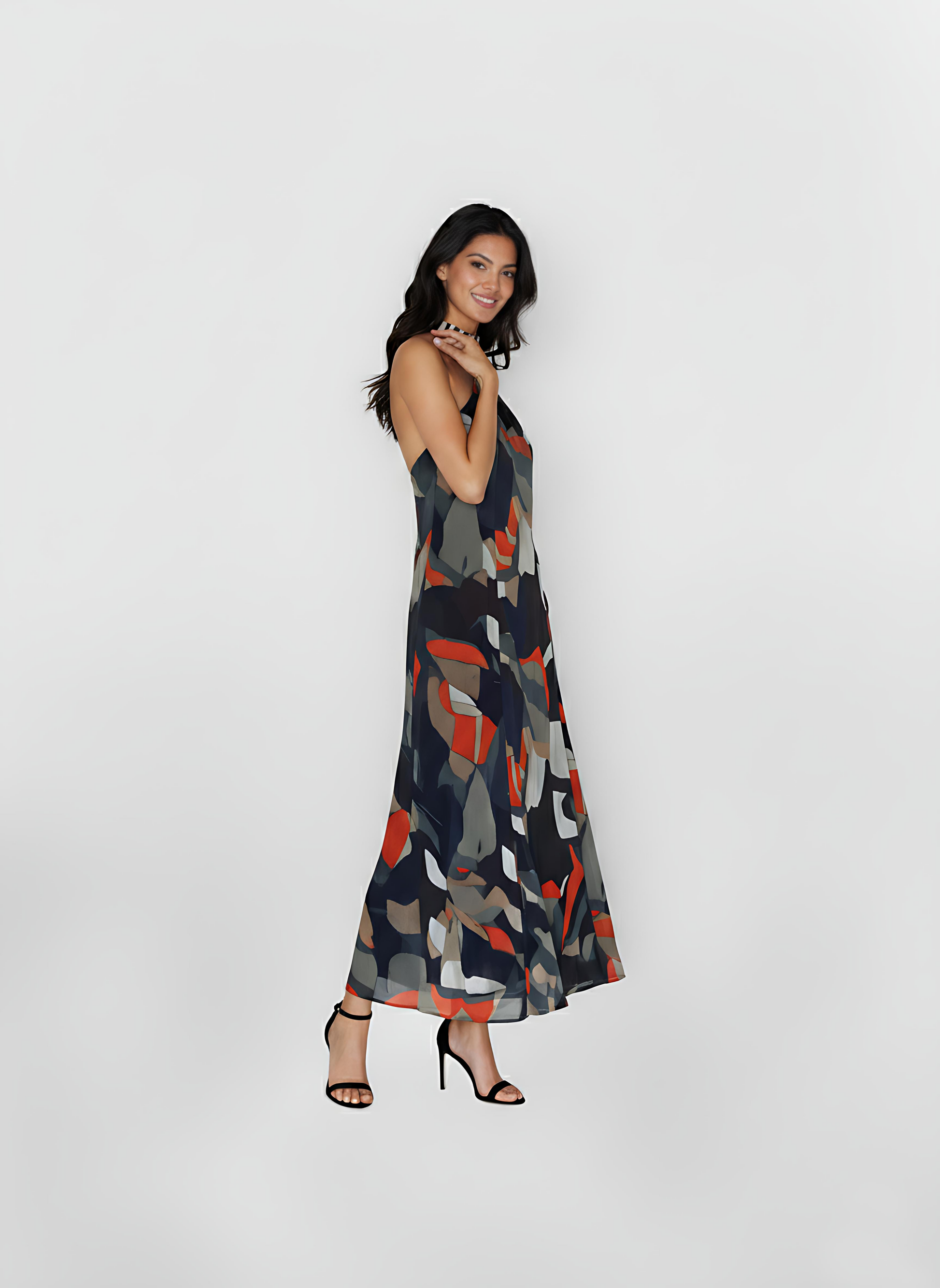 Halter-neck abstract print maxi dress with a fluid silhouette, suitable for daytime outings and resort evenings