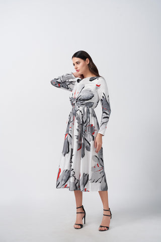 Long-sleeve floral satin midi dress with red accents, ideal for elegant gatherings and evening affairs