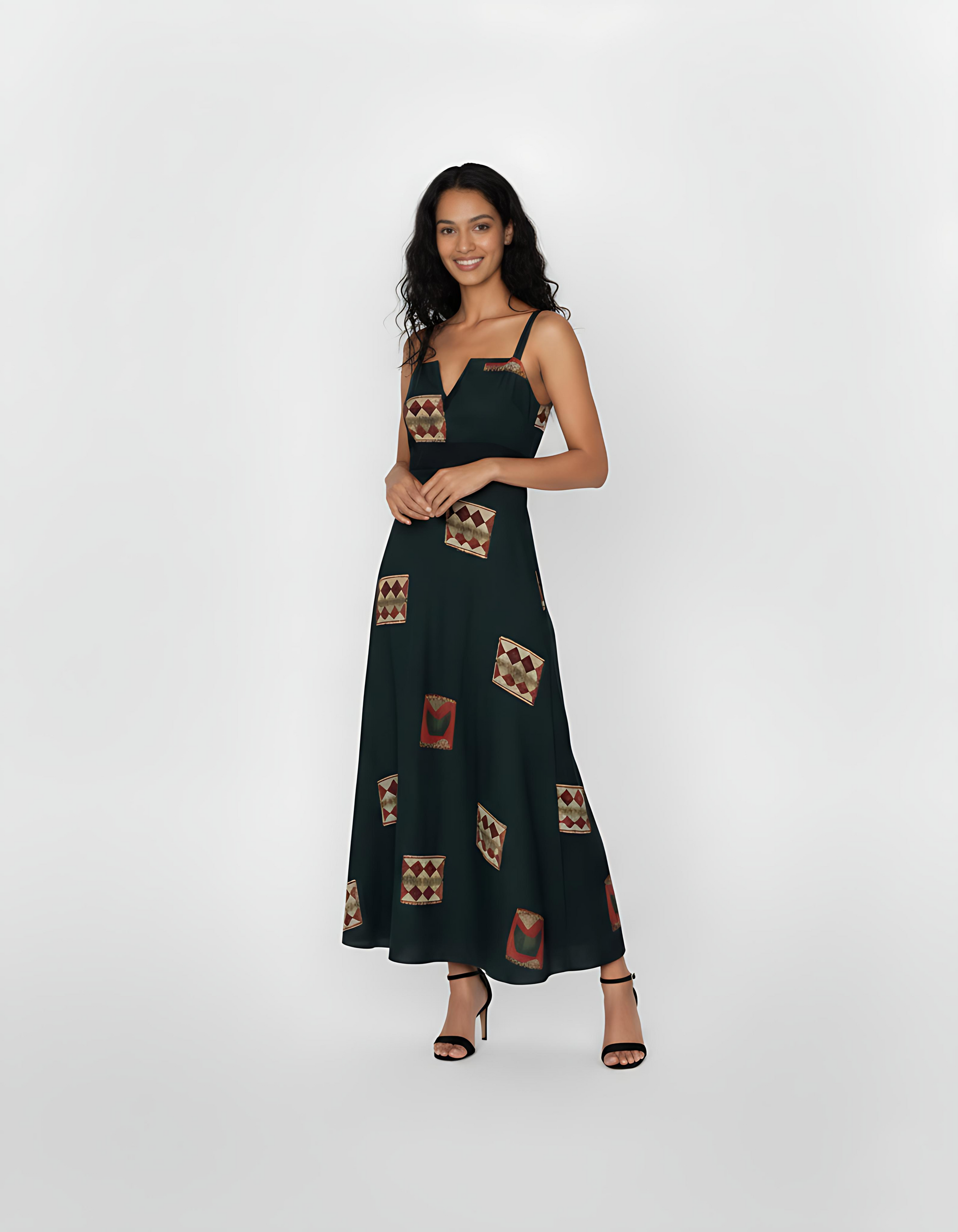 Ankle-length deep green crepe dress with wide shoulder straps, a notched square neckline, and geometric motifs in rust, beige, and maroon