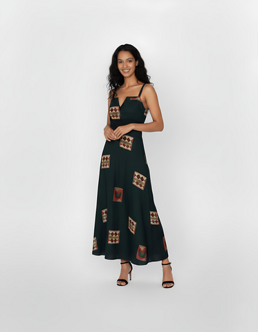 Ankle-length deep green crepe dress with wide shoulder straps, a notched square neckline, and geometric motifs in rust, beige, and maroon