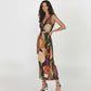 Sleeveless Chinon maxi dress with a deep V-neckline, straight silhouette, and abstract mosaic-inspired print in rust, mustard, teal, maroon, and beige tones