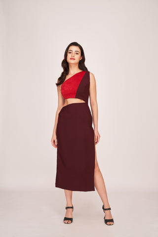 Full-length view of the Enchanté Elegance ensemble, featuring a red one-shoulder top and a high-waisted maroon skirt. The straight cut offers a sophisticated modern aesthetic.