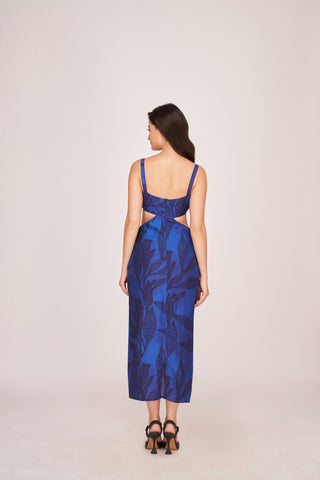 Back view of a blue silk midi dress with shoulder straps and a back zip closure