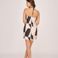 Rear view of the dress showing back zip closure, tie-back detail, and overall back silhouette.