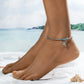 This slim and lightweight beaded anklet with its dainty leaf accent is an ideal accessory for tropical vacations.