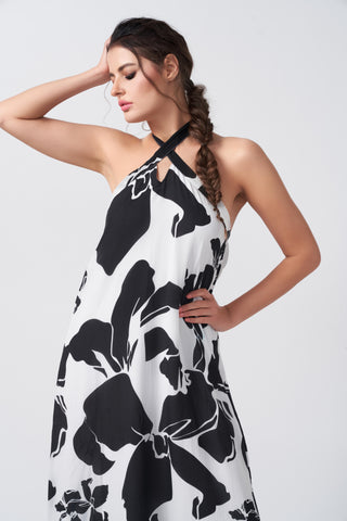 Black and white floral abstract print dress with a flowing ankle-length silhouette