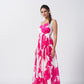 Pink and white floral ankle-length dress with a gathered flare, suitable for parties and sunset dinners