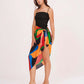 Full-length view of the Sexy Sarong Dress: featuring a sleek black top paired with a boldly printed wrap bottom, complete with an intricate waist knot and high-side slit.