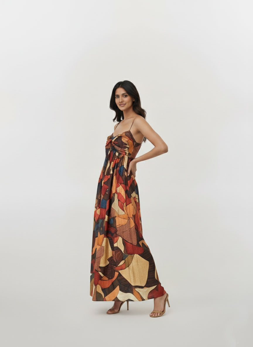 Strappy shoulder abstract maxi dress with a bow detail, suitable for brunches and resort getaways