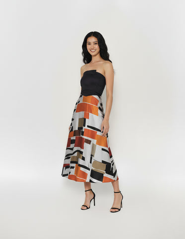 Strapless midi cotton satin tube dress with an abstract leaf-inspired print in mustard, olive, sage, and black.