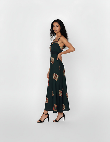 Deep green ankle-length crepe dress featuring wide shoulder straps, a notched square neckline, and earthy geometric motifs, ideal for sophisticated daytime occasions or refined evening wear.