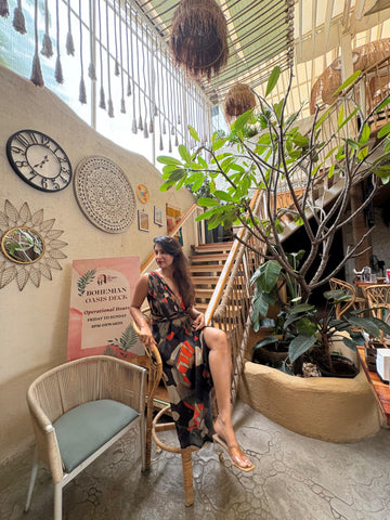 Flowing abstract maxi dress with a halter neckline, ideal for sunset dinners and destination events