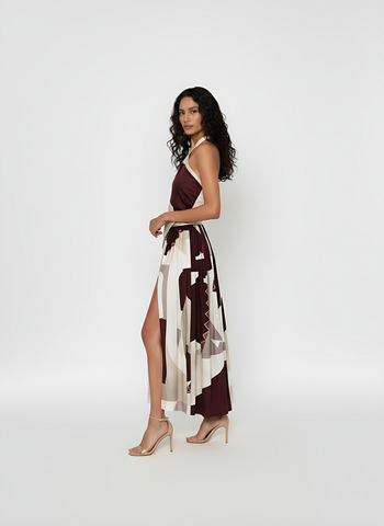 Side view of a halter-neck geometric print two-piece set with a tie-up neckline, suitable for resort evenings and destination events