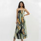 Full-length crepe maxi dress featuring a straight neckline with thin spaghetti straps and a relaxed, column-like silhouette.