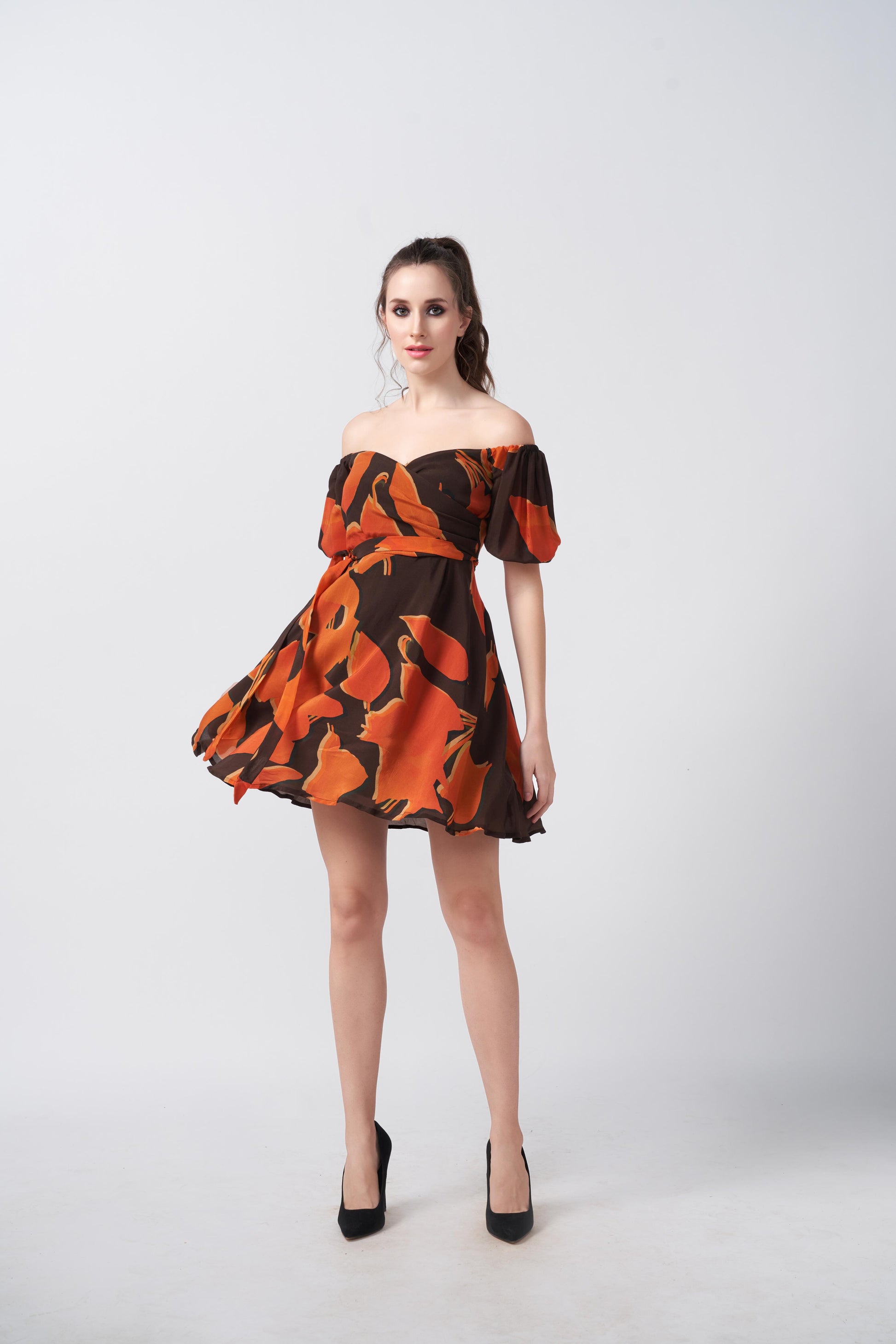 Off-shoulder dress crafted from soft crepe fabric with a self-tie waist belt, suitable for summer dates or casual outings.