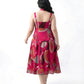 Close-up of sweetheart neckline with adjustable tie-up straps on a pink floral chinon midi dress