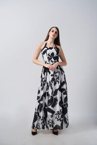 Halter-neck black and white floral ankle-length dress, suitable for upscale day events and elegant brunches