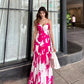 Floral print long crepe dress with spaghetti straps, ideal for evening soirées and elegant occasions