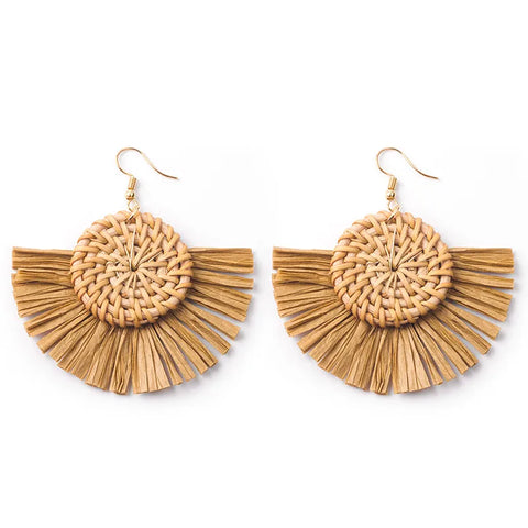 Lightweight brown rattan drop earrings with woven detailing and a fan-shaped drop, ideal for casual events and warm-weather wear.