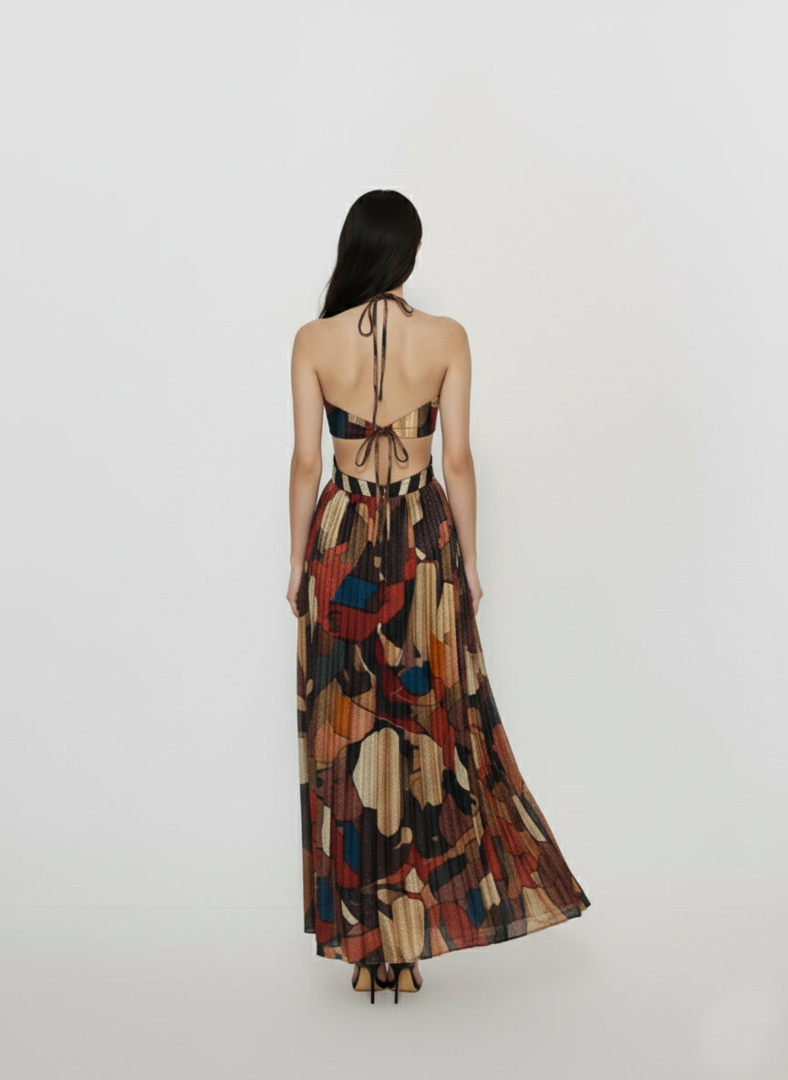 Back view of the Bohemian Mosaic Maxi Dress highlighting a deep open back with a slender tie-neck closure and a streamlined floor-length hemline.