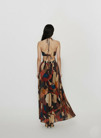 Back view of the Bohemian Mosaic Maxi Dress highlighting a deep open back with a slender tie-neck closure and a streamlined floor-length hemline.