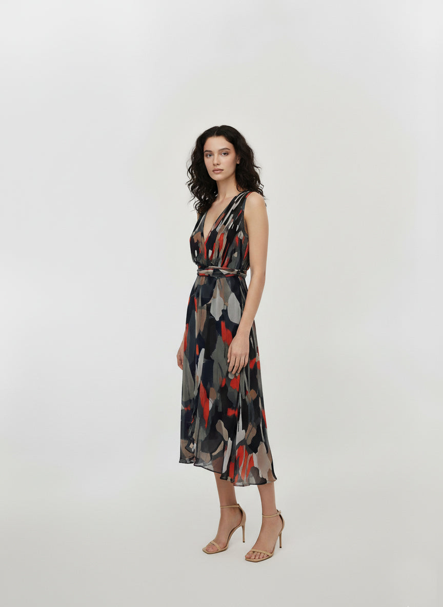 Sleeveless fit-and-flare dress featuring a deep V-neckline and a wrap-style bodice that creates a structured, flattering waist.