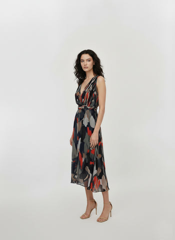 Sleeveless fit-and-flare dress featuring a deep V-neckline and a wrap-style bodice that creates a structured, flattering waist.