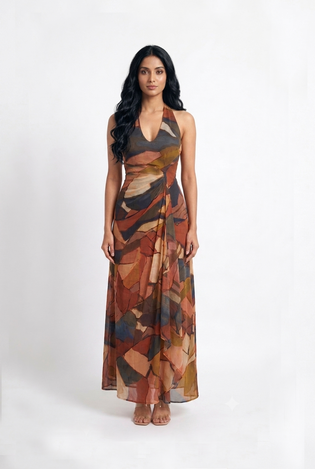 Ankle-length A-line maxi dress with a flattering ruched bodice and contemporary artistic print, ideal for special occasions and refined celebrations.