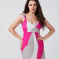 Close-up of model in short dress with wrap-stitched neckline and frill shoulder details.