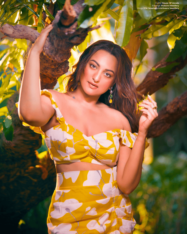 Close-up front view of the model wearing the yellow printed muslin co-ord set, highlighting the sweetheart neckline, ruched bust, and ruffle-detailed straps