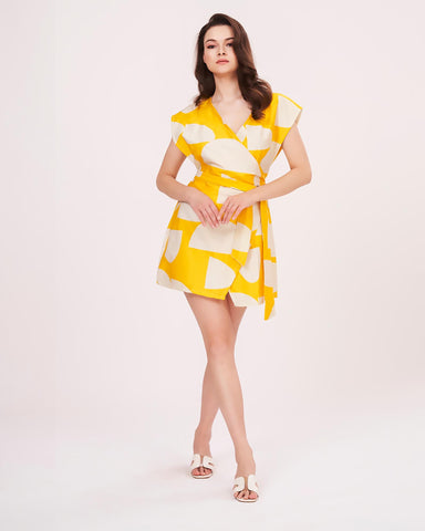 Yellow cotton satin dress with a wrap neckline and sleeveless design