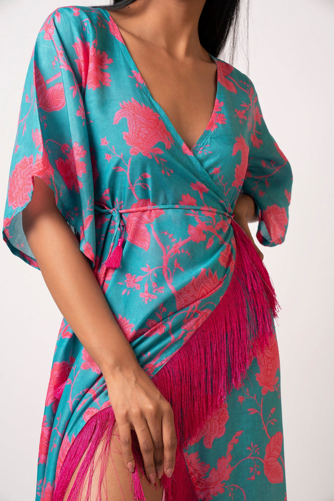 Long kaftan dress with vibrant flowers and flattering wrap style! It is made from lightweight muslin fabric