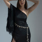 resort wear dress featuring a unique one-shoulder design, fringes, and a sea shell belt