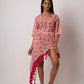This red floral beach dress is perfect as summer beach wear for women.  Its lightweight fabric, flowy silhouette, and kimono-style sleeves make it comfortable to wear all day. The sea shell belt cinches at the waist, giving you a perfectly flattering look. 