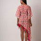 This red floral beach dress is perfect as summer beach wear for women.  Its lightweight fabric, flowy silhouette, and kimono-style sleeves make it comfortable to wear all day. The sea shell belt cinches at the waist, giving you a perfectly flattering look. 