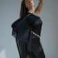 resort wear dress featuring a unique one-shoulder design, fringes, and a sea shell belt