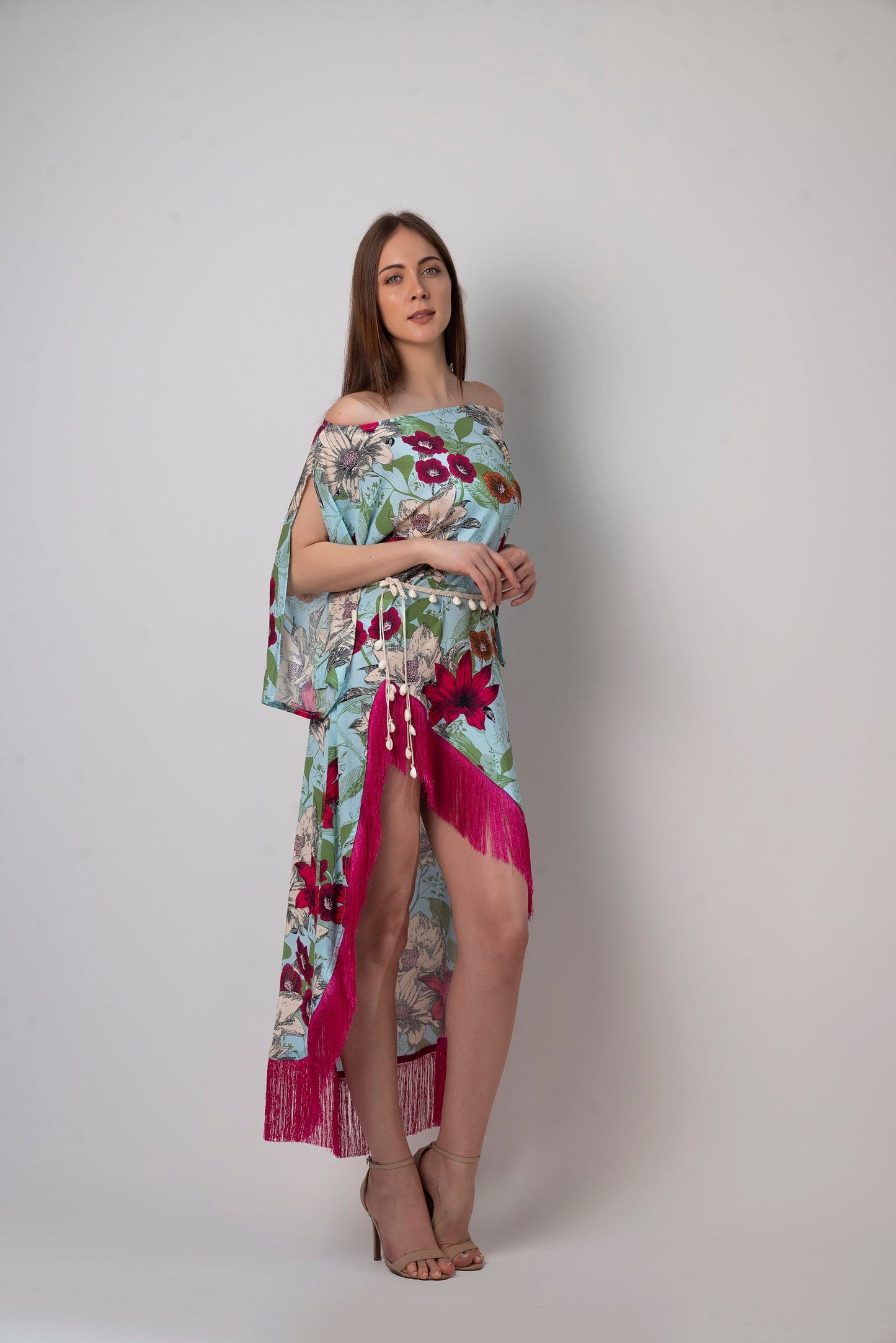 This one-shoulder floral kaftan dress is made of soft and lightweight viscose and is perfect for hot summer days by the beach
