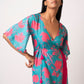 Long kaftan dress with vibrant flowers and flattering wrap style! It is made from lightweight muslin fabric