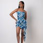 Abstract blue midi vacation dress made of breathable cotton fabric with wrap style tie-up detailing and a flattering midi length. Perfect for summer occasions
