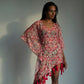 This red floral beach dress is perfect as summer beach wear for women.  Its lightweight fabric, flowy silhouette, and kimono-style sleeves make it comfortable to wear all day. The sea shell belt cinches at the waist, giving you a perfectly flattering look. 
