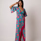 Long kaftan dress with vibrant flowers and flattering wrap style! It is made from lightweight muslin fabric