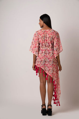 Rear view of pink floral georgette dress showing asymmetric hem and kaftan sleeves