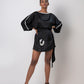 Black satin dress adorned with shell-detailed hand embroidery and lace embellishment